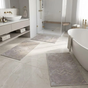set de trois tapis de salle de bain grege avec un trait zig zag doré